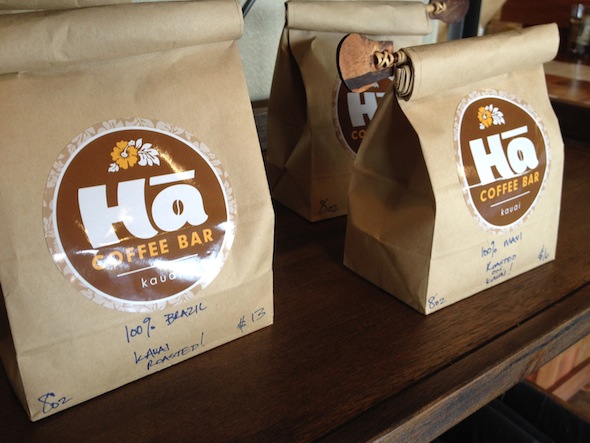 A few brown paper bags of Ha coffee
