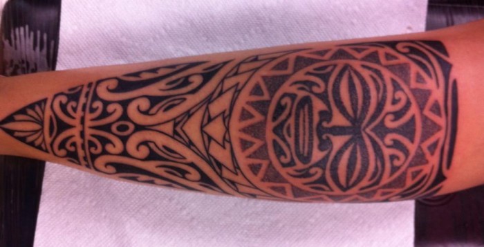 Polynesian-themed tattoo