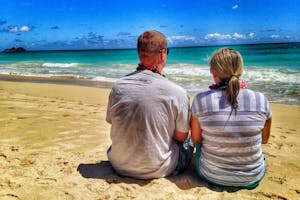 couple-on-hawaii-beach couple on a Hawaii beach looking out at the ocean