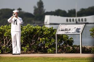 Pearl Harbor 71st Anniversary a sailor playing the trumpet