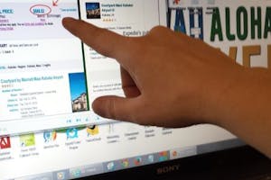 No hidden fees finger pointing at computer screen