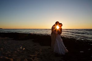 Wedding couple during sunset on the Big island of Hawaii