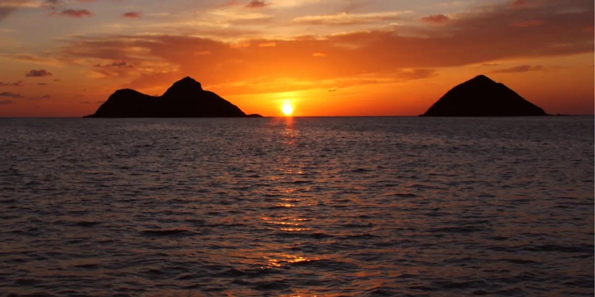 Lanikai sunrise between the Mokulua islands Lanikai sunrise between the Mokulua islands